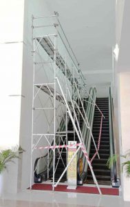 Scaffold-on-escalator